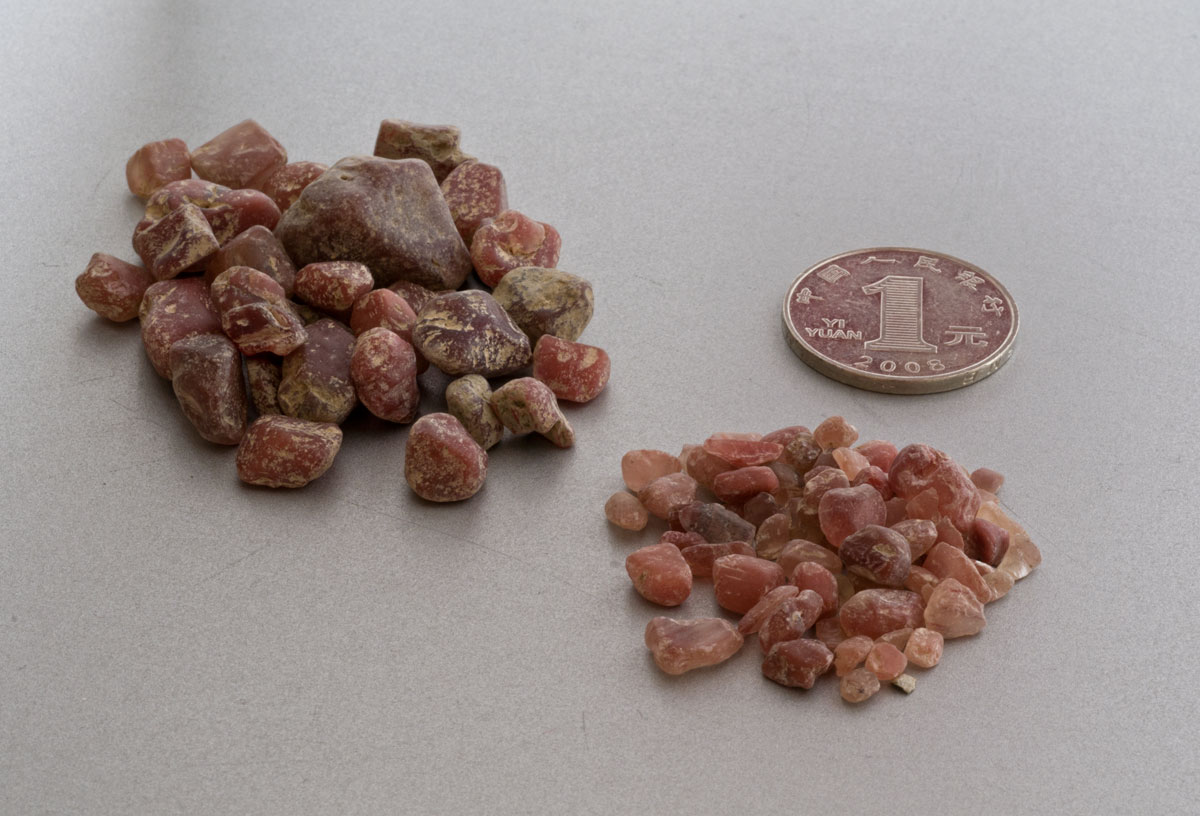 Figure 15. Two parcels of andesine purchased from villagers in Tibet's andesine mining district. Photo: Wimon Manorotkul