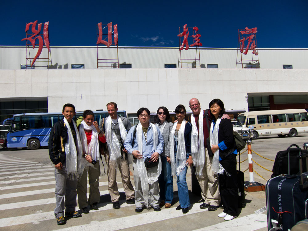 Figure 2. Team Tibet 2010 on arrival at Lhasa airport. From left to right: Ahmadjan Abduriyim, Flavie Isatelle, Brendan Laurs, Thanong Leelawatanasuk, Young Sze Man, Christina Iu, Richard Hughes and Lou Li Ping.