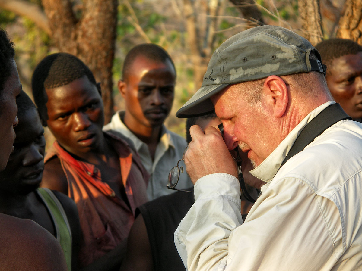Richard Hughes examining a sapphire in Tanzania's Tunduru district
