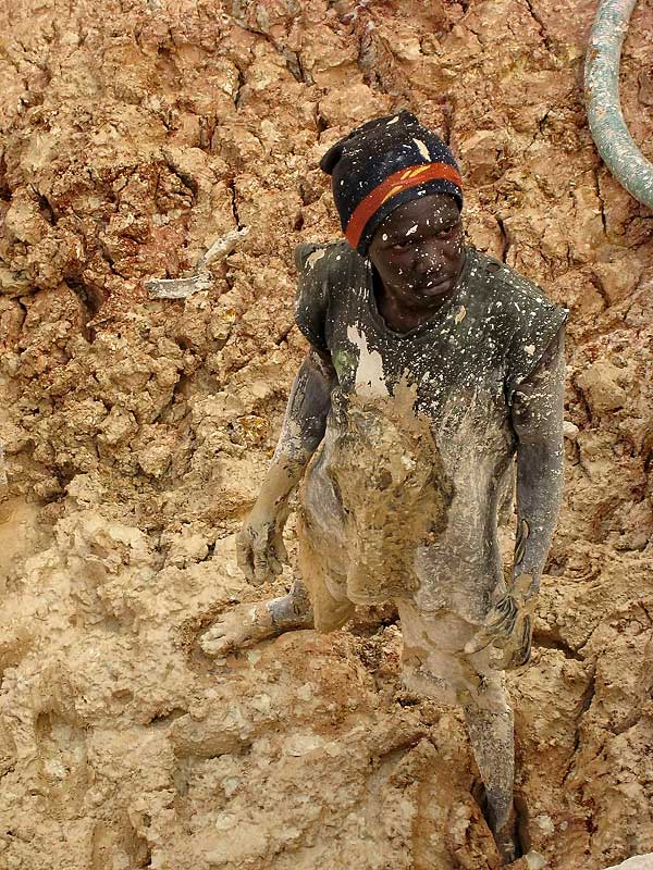 A mud-spattered sapphire miner at Ngembambili Amanimakoro, Songea. Richard Hughes, Lotus Gemology.