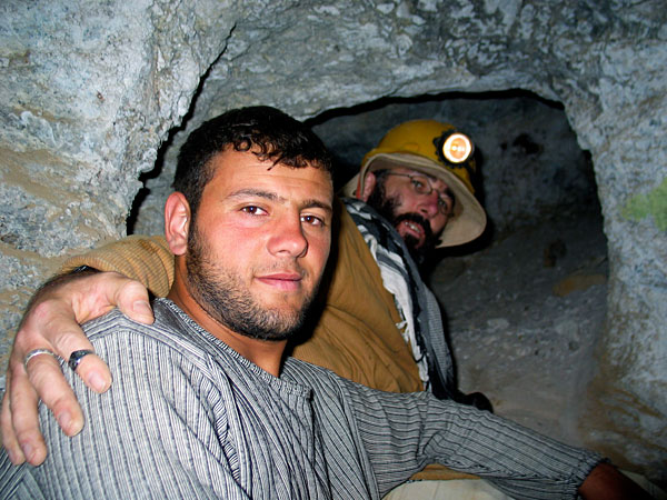 A miner with Vincent Pardieu inside the old galleries at Kuh-i-Lal